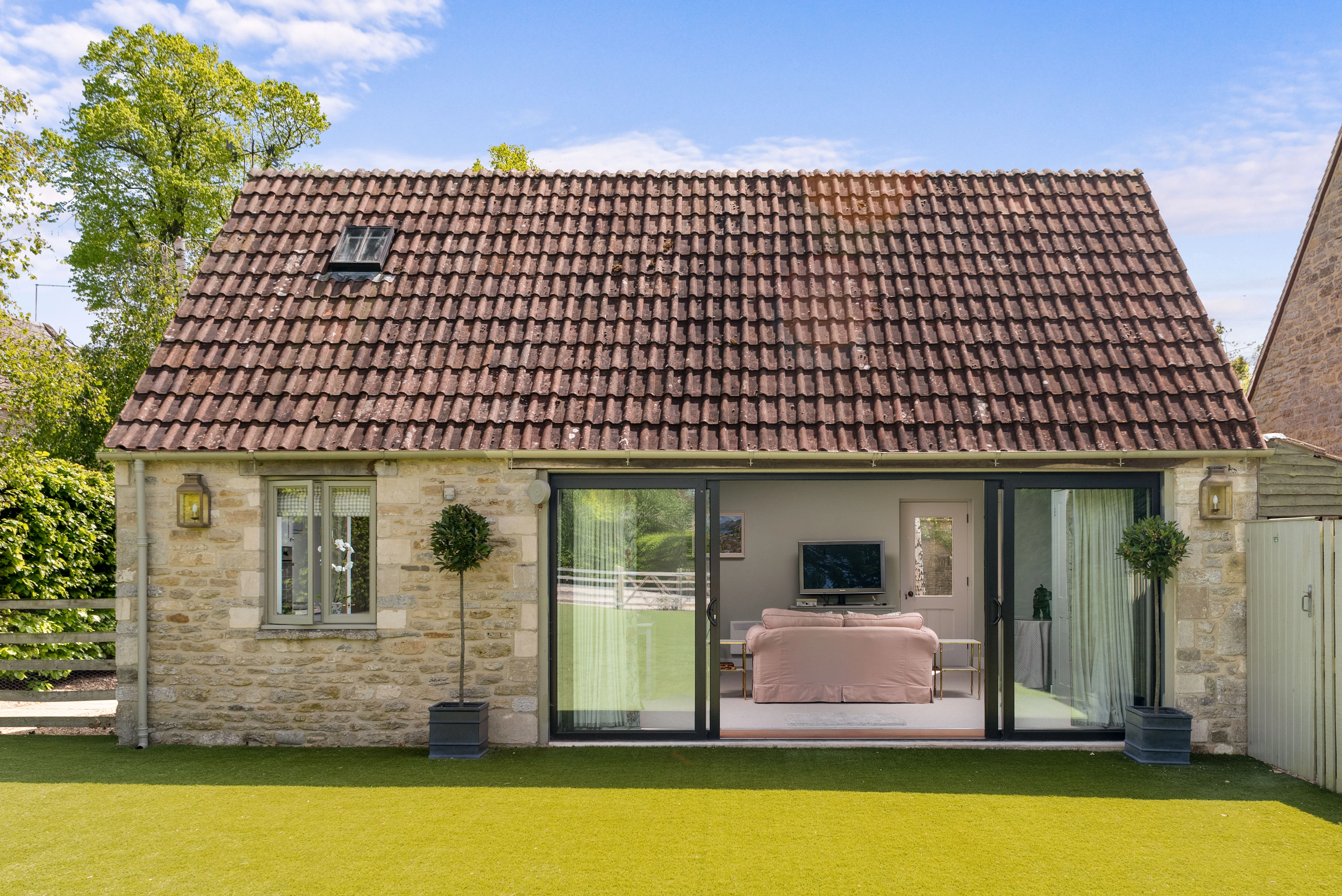 The Old Hay Barn — stone cottage with a contemporary glazed extension