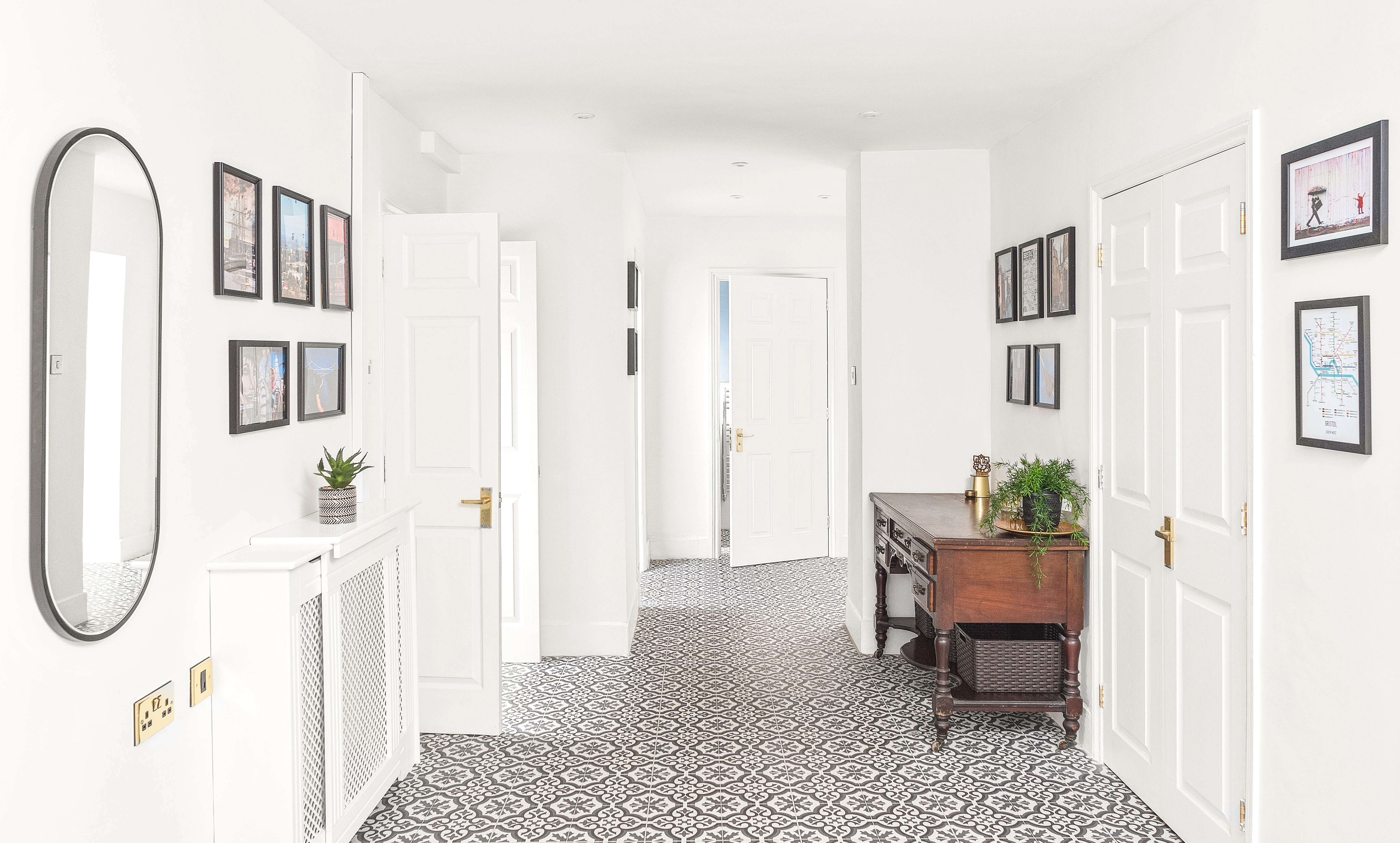 Sneyd Park hallway — patterned tile floor, framed wall art